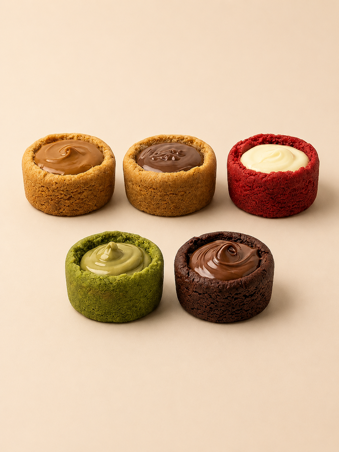 Cup cookies in Red Velvet, Classic, Lotus, Pistachio, and Nutella flavors